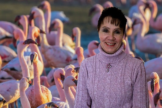 Amanda Hamann against a backdrop of flamingos in Swakopmund.