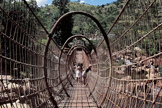 People exploring the Spider Web Sway Bridge.