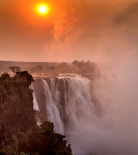 Sunset over Victoria Falls.