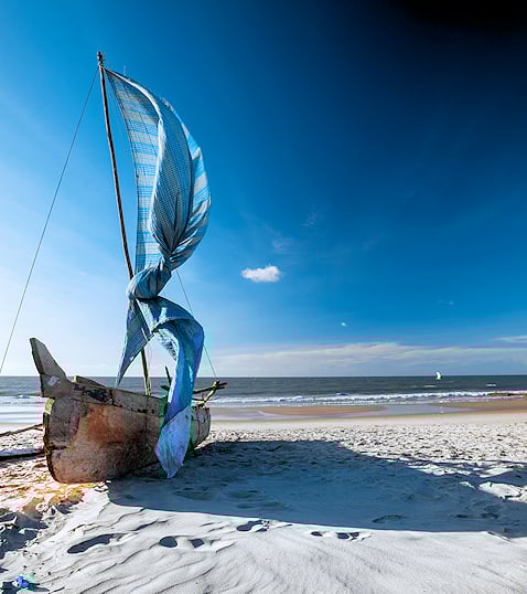 Dhow on a tropical beach in Mozambique.