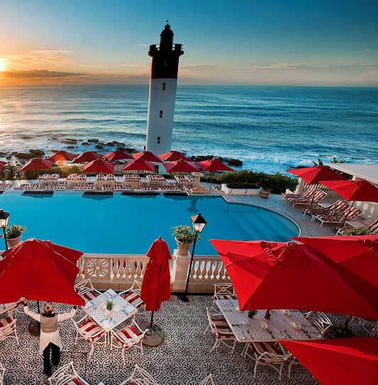 Wide view of the ocean and lighthouse from the Oysterbox Hotel in Durban.