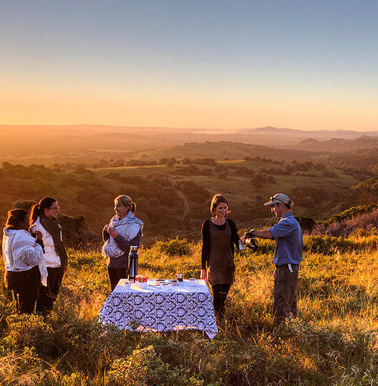Guests enjoying morning coffee in the wilderness of the Eastern Cape.
