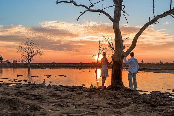 A couple photographed at sunset in Africa.