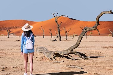 Lady on safari at Sossusvlei in Namibia.