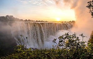 Victoria Falls at sunset.