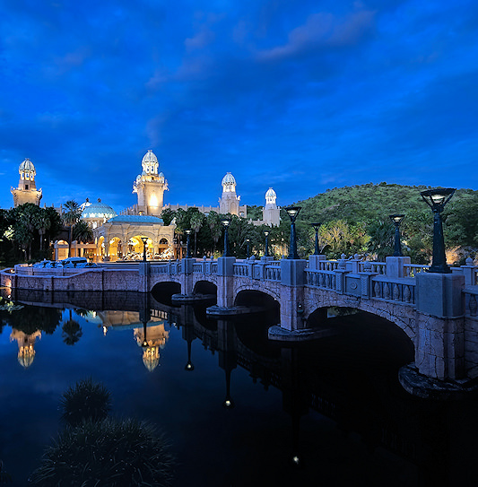 Exterior of The Palace of the Lost City illuminated at night, South Africa.
