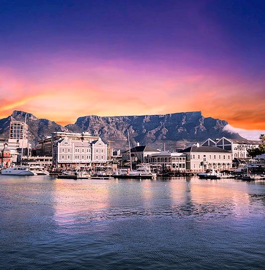 Table Mountain behind the V&A Waterfront at sunset, Cape Town.