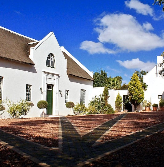 Cape Dutch building with a thatched roof in the Overberg.