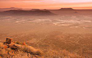 The breathtaking semi-arid landscape of the Karoo at sunset.