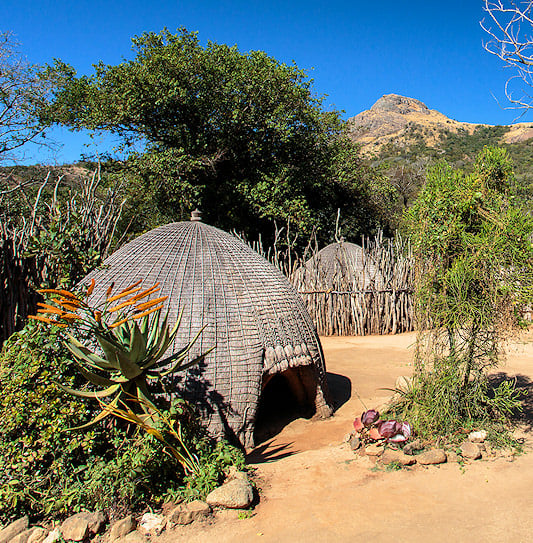 Traditional grass huts at a Swazi village in Eswatini.
